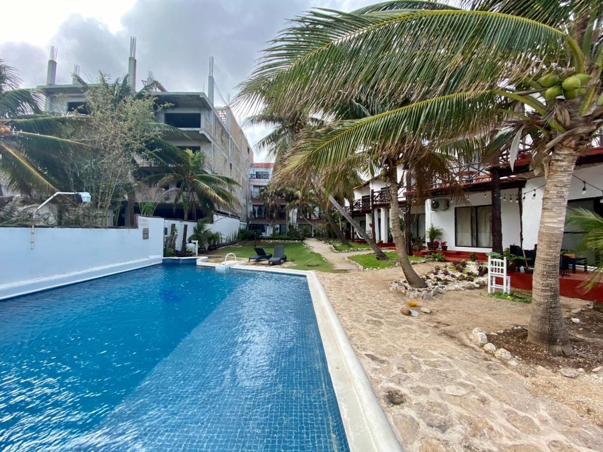 Casa Caribe קנקון מראה חיצוני תמונה A pool at a hotel in San Juan del Sur