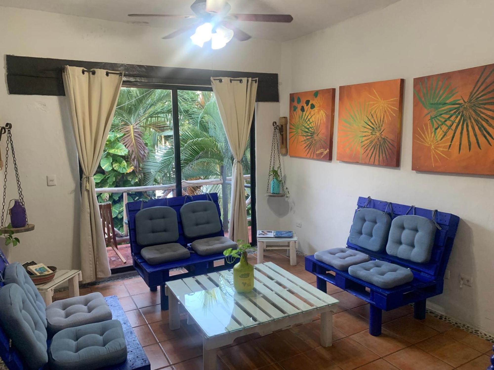 Casa Caribe קנקון מראה חיצוני תמונה Living room with a view of the ocean